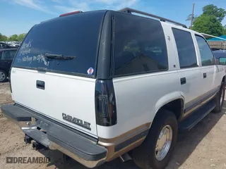 1996 Chevrolet Tahoe with VIN 1GNEK13R4TJ340094, listed as a IAAI auction lot 42044326 with 178,418 mi miles. Bid and sale history available at carsss.com. Image 4.
