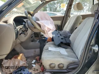 1994 Toyota Camry LE z VIN 4T1SK12E6RU408523, wystawiony jako Copart lot #56314665 z przebiegiem 221 867 mil mil oraz Szkoda całkowita • Salvage title. Historia ofert i sprzedaży dostępna na DreamBid. Obrazek 7.