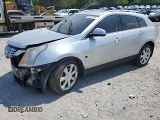 2014 Cadillac SRX Premium Collection z VIN 3GYFNGE34ES596182, wystawiony jako Copart lot #55151195 z przebiegiem 147 072 mil mil oraz Czysty tytuł • Clean title. Historia ofert i sprzedaży dostępna na DreamBid. Obrazek 1.