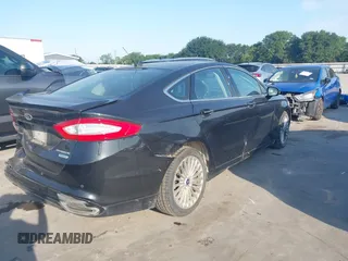 2014 Ford Fusion Titanium with VIN 3FA6P0K94ER115795, listed as a IAAI auction lot 42230295 with 266,277 mi miles and . Bid and sale history available at DreamBid. Image 4.