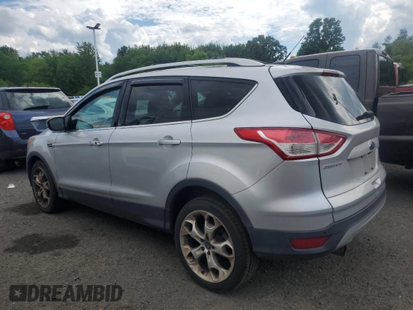 2013 Ford Escape Titanium with VIN 1FMCU9J90DUB31927, listed as a Copart auction lot 63701025 with 205,843 mi miles and Clean title. Bid and sale history available at DreamBid. Image 2.