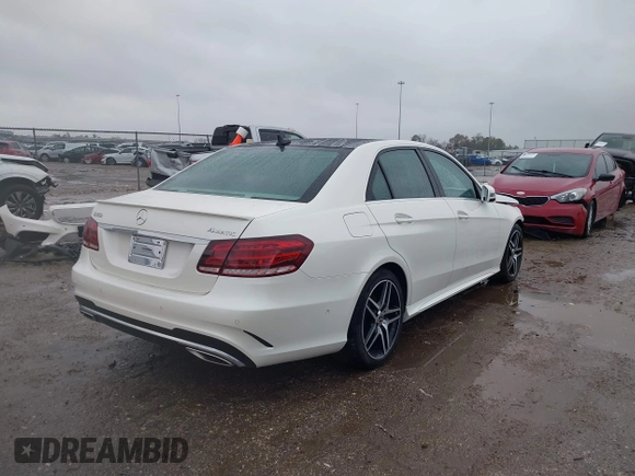2014 Mercedes-Benz E 550 Sport with VIN WDDHF9BB3EB017140, listed as a IAAI auction lot 41424799 with 32,537 mi miles and . Bid and sale history available at DreamBid. Image 4.