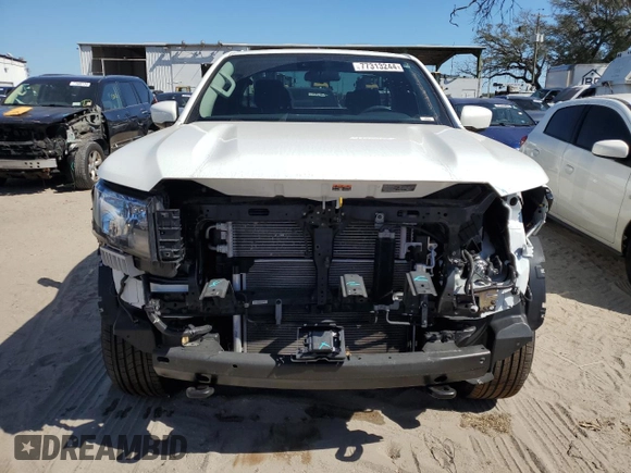2023 Nissan Frontier S z VIN 1N6ED1CMXPN609671, wystawiony jako Copart lot #77313244 z przebiegiem 38 243 mil mil oraz Szkoda całkowita • Salvage title. Historia ofert i sprzedaży dostępna na DreamBid. Obrazek 5.