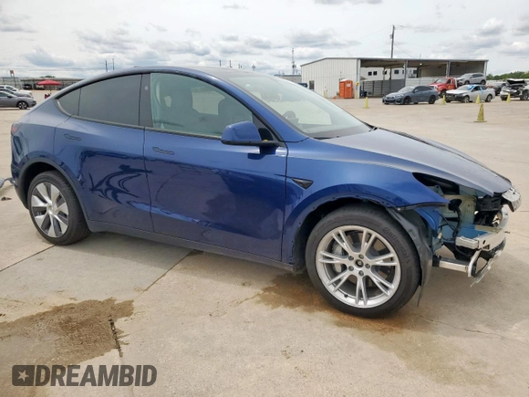2024 Tesla Model Y Long Range with VIN 7SAYGDEE2RF986014, listed as a Copart auction lot 55791145 with 12,344 mi miles and Salvage title. Bid and sale history available at DreamBid. Image 4.