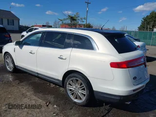 2013 Lincoln MKT EcoBoost with VIN 2LMHJ5AT8DBL55167, listed as a IAAI auction lot 41894396 with 121,114 mi miles. Bid and sale history available at carsss.com. Image 3.