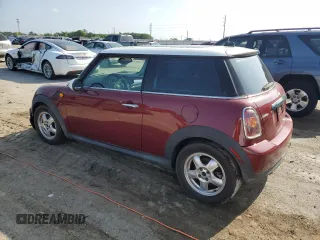 2007 MINI Hardtop z VIN WMWMF335X7TT55336, wystawiony jako Copart lot #51109595 z przebiegiem 132 358 mil mil oraz Czysty tytuł • Clean title. Historia ofert i sprzedaży dostępna na DreamBid. Obrazek 2.