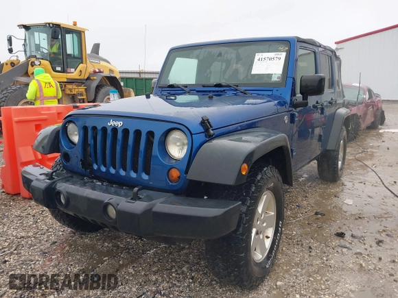 2009 Jeep Wrangler Unlimited X with VIN 1J4GA39189L787777, listed as a IAAI auction lot 41570579 with 193,163 mi miles. Bid and sale history available at carsss.com. Image 17.