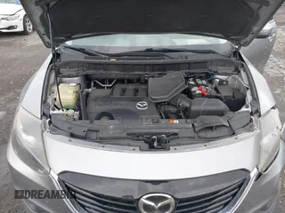 2015 Mazda CX-9 Sport with VIN JM3TB3BV2F0454770, listed as a IAAI auction lot 42009879 with 98,916 mi miles and . Bid and sale history available at carsss.com. Image 10.
