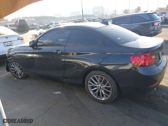 2014 BMW 2 Series 228i with VIN WBA1F5C57EV256067, listed as a IAAI auction lot 41283608 with 108,128 mi miles. Bid and sale history available at carsss.com. Image 14.