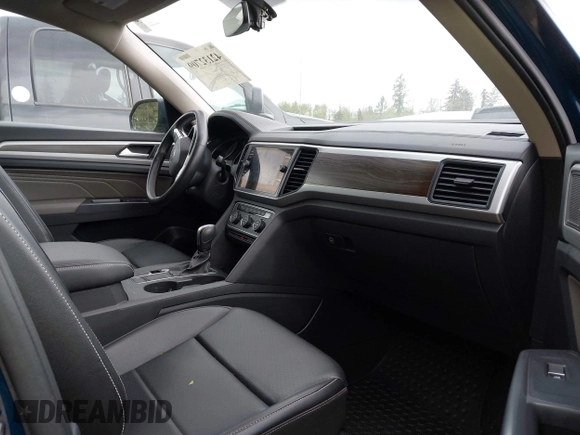2021 Volkswagen Atlas SE z VIN 1V2WR2CA7MC568779, wystawiony jako IAAI lot #42132709 z przebiegiem 51 205 mil mil oraz . Historia ofert i sprzedaży dostępna na DreamBid. Obrazek 5.