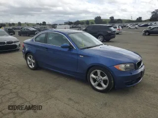2009 BMW 1 Series 128i with VIN WBAUP93529VF49255, listed as a Copart auction lot 51100045 with 153,841 mi miles and Clean title. Bid and sale history available at DreamBid. Image 4.