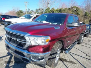 2019 Ram 1500 Big Horn/Lone Star with VIN 1C6SRFFT8KN870451, listed as a IAAI auction lot 41639815 with 100,924 mi miles. Bid and sale history available at carsss.com. Image 2.