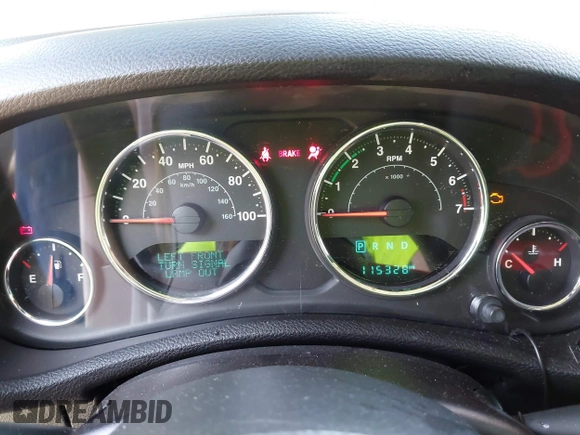 2015 Jeep Wrangler Unlimited Willys Wheeler with VIN 1C4BJWDG9FL750049, listed as a IAAI auction lot 42136188 with 115,328 mi miles and . Bid and sale history available at DreamBid. Image 7.