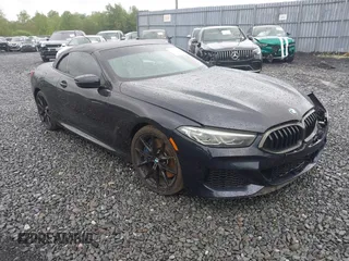 2019 BMW 8 Series M850i xDrive z VIN WBAFY4C58KBX29742, wystawiony jako IAAI lot #42281144 z przebiegiem 74 880 mil mil oraz . Historia ofert i sprzedaży dostępna na DreamBid. Obrazek 1.
