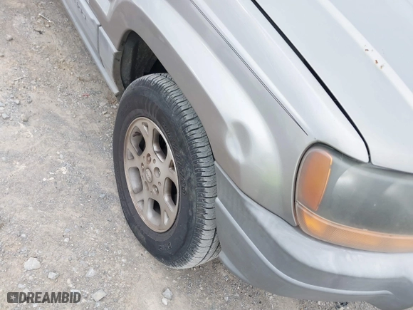 1999 Jeep Grand Cherokee Laredo with VIN 1J4GW58N4XC676836, listed as a IAAI auction lot 41799381 with 203,784 mi miles. Bid and sale history available at carsss.com. Image 6.