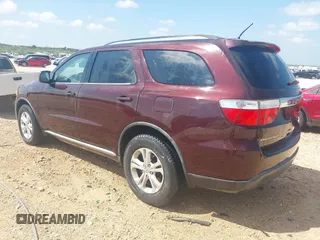 2012 Dodge Durango SXT with VIN 1C4RDHAG8CC361176, listed as a IAAI auction lot 42643631 with 201,419 mi miles and . Bid and sale history available at DreamBid. Image 3.