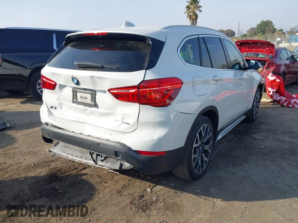 2022 BMW X1 sDrive28i with VIN WBXJG7C05N5U58988, listed as a IAAI auction lot 41466393 with 56,062 mi miles. Bid and sale history available at carsss.com. Image 4.