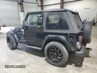 2001 Jeep Wrangler Sport with VIN 1J4FA49S01P352257, listed as a Copart auction lot 47084425 with 114,414 mi miles and Salvage Title. Bid and sale history available at carsss.com. Image 2.