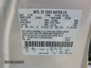 2010 Ford Escape XLS with VIN 1FMCU0C70AKB52226, listed as a Copart auction lot 58241455 with 237,785 mi miles and Salvage title. Bid and sale history available at DreamBid. Image 12.