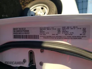 2023 Ram 1500 Tradesman with VIN 3C6RR7KG7PG555086, listed as a Copart auction lot 79924014 with 35,476 mi miles and Salvage title. Bid and sale history available at DreamBid. Image 12.