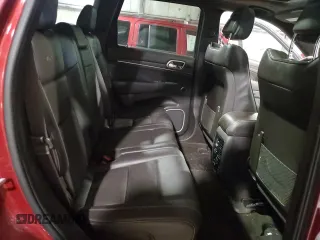 2015 Jeep Grand Cherokee Summit with VIN 1C4RJFJG2FC664245, listed as a Copart auction lot 54131515 with 141,605 mi miles and Salvage Title. Bid and sale history available at DreamBid. Image 11.