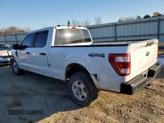 2021 Ford F-150 XL with VIN 1FTFW1E53MFA02704, listed as a Copart auction lot 87911895 with 137,651 mi miles and Salvage Title. Bid and sale history available at carsss.com. Image 2.