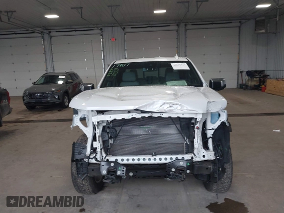 2023 Chevrolet Silverado 1500 LTZ with VIN 1GCUDGEDXPZ100414, listed as a IAAI auction lot 40005559 with 40,000 mi miles and . Bid and sale history available at DreamBid. Image 13.