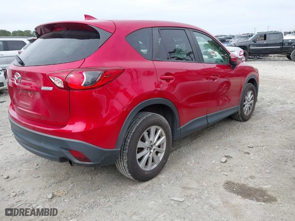 2016 Mazda CX-5 Touring with VIN JM3KE2CY3G0894441, listed as a IAAI auction lot 41508767 with NaN miles. Bid and sale history available at carsss.com. Image 4.