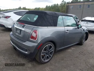 2010 MINI Convertible S with VIN WMWMS3C59ATY51392, listed as a IAAI auction lot 42192716 with 117,628 mi miles and . Bid and sale history available at DreamBid. Image 4.