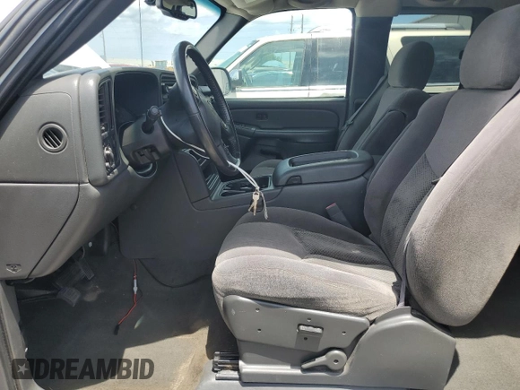 2005 Chevrolet Silverado 1500 LS with VIN 2GCEC19T351259657, listed as a Copart auction lot 60843785 with 162,230 mi miles and Salvage title. Bid and sale history available at DreamBid. Image 7.