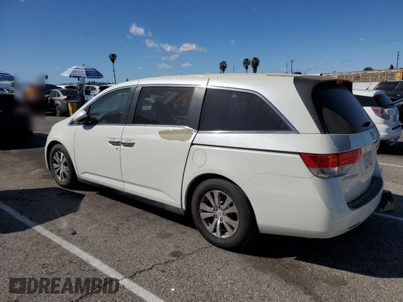 2014 Honda Odyssey EX-L with VIN 5FNRL5H6XEB060557, listed as a Copart auction lot 47141835 with 214,718 mi miles and Clean Title. Bid and sale history available at DreamBid. Image 2.