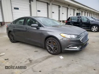 2018 Ford Fusion SE z VIN 3FA6P0HD8JR245391, wystawiony jako Copart lot #53571445 z przebiegiem 158 138 mil mil oraz Czysty tytuł • Clean title. Historia ofert i sprzedaży dostępna na DreamBid. Obrazek 4.