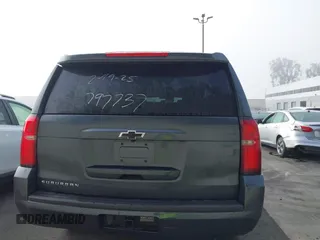 2020 Chevrolet Suburban LT z VIN 1GNSCHKC8LR151570, wystawiony jako IAAI lot #41677348 z przebiegiem Nie podano mil oraz . Historia ofert i sprzedaży dostępna na DreamBid. Obrazek 16.