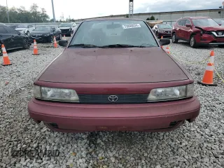 1991 Toyota Camry DLX z VIN 4T1SV21E0MU450578, wystawiony jako Copart lot #73990024 z przebiegiem 149 342 mil mil oraz Czysty tytuł • Clean title. Historia ofert i sprzedaży dostępna na DreamBid. Obrazek 5.