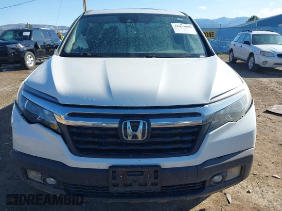 2020 Honda Ridgeline RTL with VIN 5FPYK3F50LB028430, listed as a IAAI auction lot 42033090 with Not provided miles and . Bid and sale history available at DreamBid. Image 12.