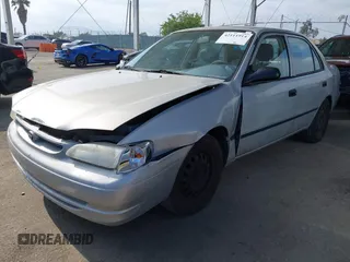 2000 Toyota Corolla VE with VIN 1NXBR12E6YZ393077, listed as a IAAI auction lot 42111914 with 181,056 mi miles and . Bid and sale history available at DreamBid. Image 2.