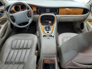 1998 Jaguar XJ with VIN SAJHX1248WC835728, listed as a Copart auction lot 86698244 with 116,768 mi miles and Clean title. Bid and sale history available at DreamBid. Image 8.