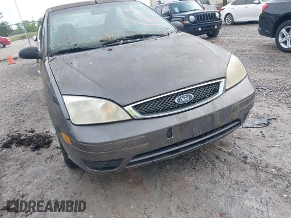 2007 Ford Focus S z VIN 1FAFP34N17W212691, wystawiony jako IAAI lot #42130099 z przebiegiem 214 101 mil mil oraz . Historia ofert i sprzedaży dostępna na DreamBid. Obrazek 6.