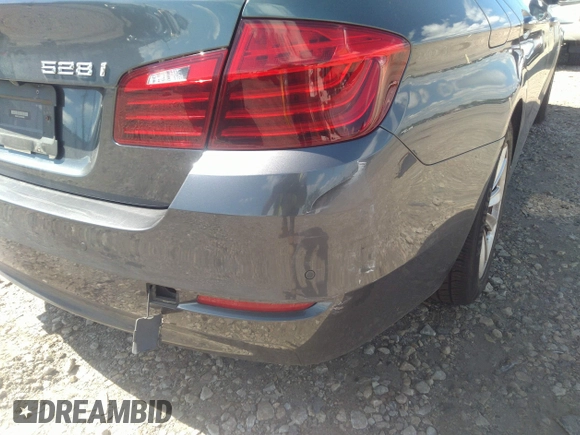 2015 BMW 5 Series 528i xDrive with VIN WBA5A7C55FD628489, listed as a IAAI auction lot 39752634 with 74,792 mi miles and . Bid and sale history available at carsss.com. Image 13.