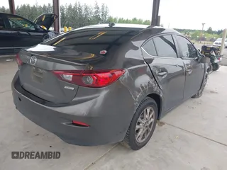 2015 Mazda 3 i Grand Touring with VIN JM1BM1W74F1264770, listed as a IAAI auction lot 42290722 with 161,617 mi miles and . Bid and sale history available at DreamBid. Image 4.