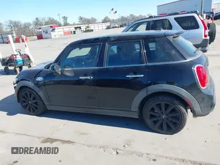 2015 MINI Hardtop 4 Door S with VIN WMWXU3C53F2B56459, listed as a IAAI auction lot 41400624 with 233,850 mi miles and . Bid and sale history available at DreamBid. Image 14.