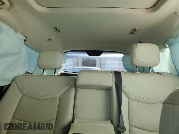2021 Cadillac XT6 Premium Luxury z VIN 1GYKPCRS5MZ110015, wystawiony jako Copart lot #49323935 z przebiegiem 28 453 mil mil oraz Czysty tytuł • Clean title. Historia ofert i sprzedaży dostępna na DreamBid. Obrazek 10.