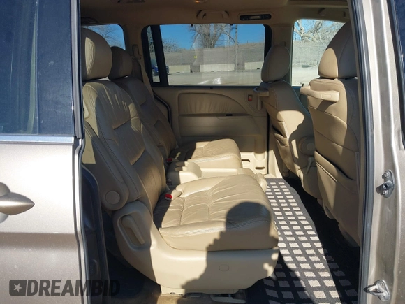 2010 Honda Odyssey EX-L with VIN 5FNRL3H79AB048049, listed as a IAAI auction lot 41440910 with 142,385 mi miles. Bid and sale history available at carsss.com. Image 8.