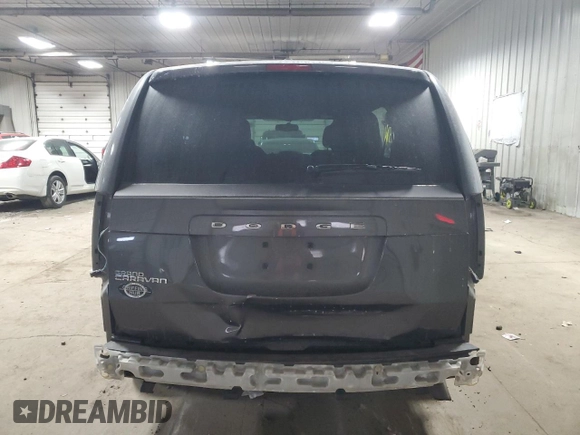 2014 Dodge Grand Caravan SE 30th Anniversary with VIN 2C4RDGBGXER458141, listed as a Copart auction lot 42140345 with 61,776 mi miles and Clean Title. Bid and sale history available at DreamBid. Image 6.