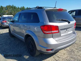 2019 Dodge Journey SE with VIN 3C4PDCBB7KT872524, listed as a IAAI auction lot 42093711 with 86,519 mi miles and . Bid and sale history available at DreamBid. Image 3.