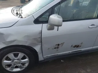 2007 Nissan Versa S z VIN 3N1BC13E47L369909, wystawiony jako IAAI lot #41831330 z przebiegiem 115 767 mil mil oraz . Historia ofert i sprzedaży dostępna na DreamBid. Obrazek 17.