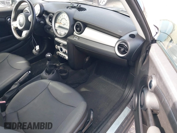 2010 MINI Hardtop with VIN WMWMF3C5XATU77265, listed as a IAAI auction lot 42007797 with 28,856 mi miles and . Bid and sale history available at DreamBid. Image 5.
