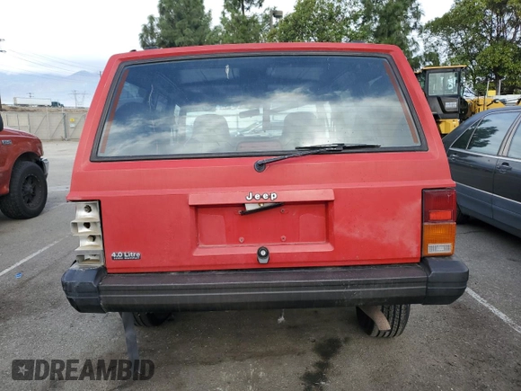 1996 Jeep Cherokee Sport with VIN 1J4FT68S8TL232241, listed as a Copart auction lot 82170904 with 287,125 mi miles and Salvage Title. Bid and sale history available at carsss.com. Image 6.