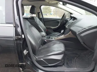 2012 Ford Focus SEL with VIN 1FAHP3H27CL348358, listed as a IAAI auction lot 41967061 with 146,432 mi miles. Bid and sale history available at carsss.com. Image 5.