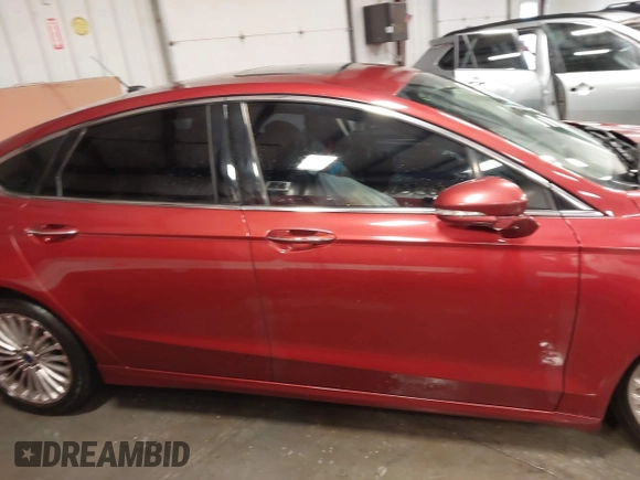 2014 Ford Fusion Titanium with VIN 3FA6P0K97ER324027, listed as a IAAI auction lot 41327141 with 161,045 mi miles and . Bid and sale history available at DreamBid. Image 13.